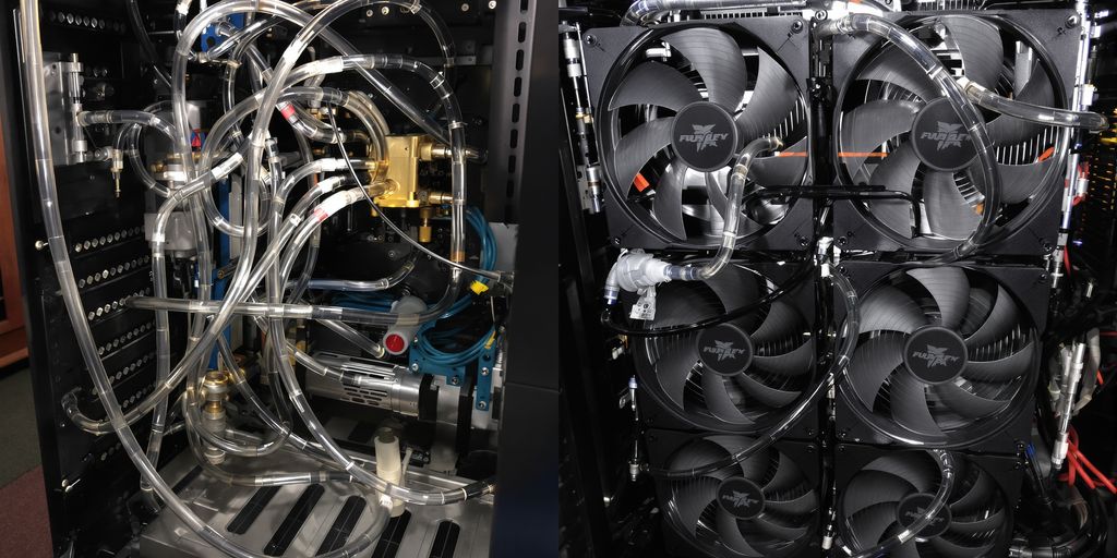 Mining rig with water cooling tubes and fans.